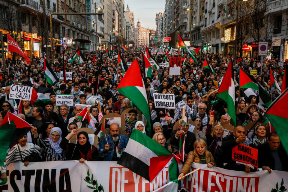 Demonstrators hold placards reading "boycott Israel!" during a protest in support of Palestinians on January 27, 2024 in Madrid, Spain.<span class="copyright">Pablo Blazquez Dominguez—Getty Images</span>