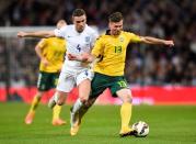 Football - England v Lithuania - UEFA Euro 2016 Qualifying Group E - Wembley Stadium, London, England - 27/3/15 England's Jordan Henderson in action with Lithuania's Saulius Mikoliunas Reuters / Dylan Martinez Livepic