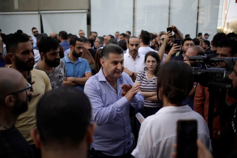 Rami Assoum speaks to Reuters during a protest in Beirut