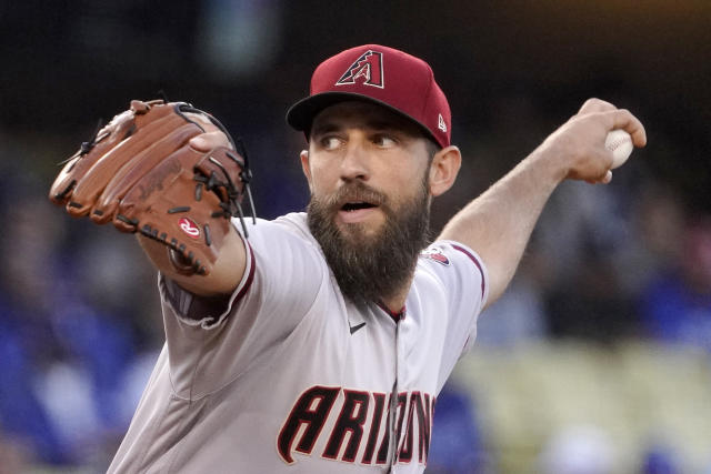 Arizona Diamondbacks starting pitcher Madison Bumgarner throws to the plate during the first inning of a baseball game against the Los Angeles Dodgers Monday, May 16, 2022, in Los Angeles. (AP Photo/Mark J. Terrill)