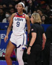 United States' coach Cheryl Reeve talks to A'ja Wilson as she takes the court during their game at the women's Basketball World Cup in Sydney, Australia, Saturday, Sept. 24, 2022. (AP Photo/Mark Baker)