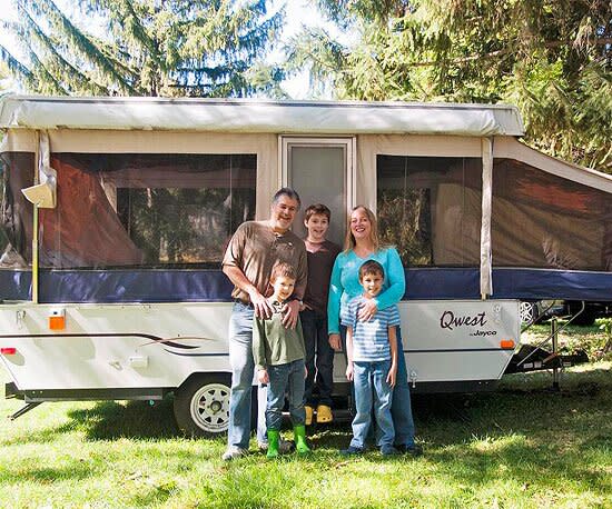 family by their camper