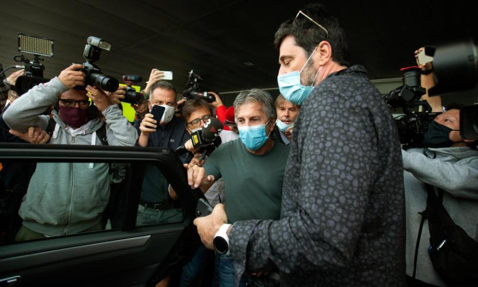 Jorge Messi (centre) arrives at El Prat Airport in Barcelona on Wednesday.