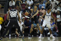 San Antonio Spurs' Victor Wembanyama passes against the Portland Trail Blazers during the first half of an NBA summer league basketball game Sunday, July 9, 2023, in Las Vegas. (AP Photo/John Locher)