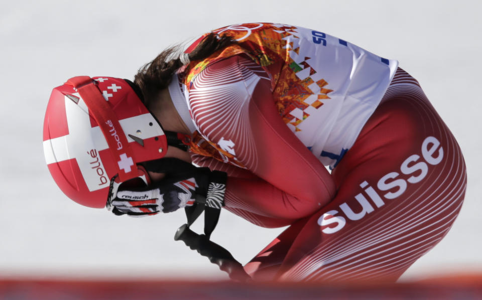 Switzerland's Dominique Gisin reacts after a women's downhill training run for the Sochi 2014 Winter Olympics, Friday, Feb. 7, 2014, in Krasnaya Polyana, Russia. (AP Photo/Gero Breloer)