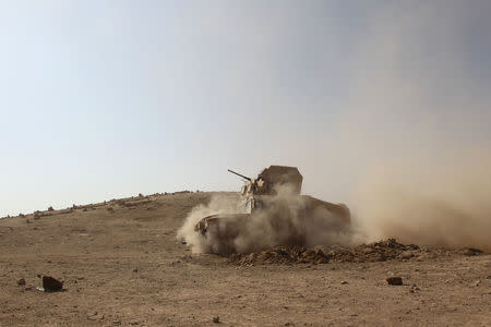 A vehicle of the Iraqi army drives south of Mosul, Iraq October 30, 2016. REUTERS/Stringer