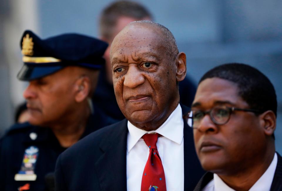 In this April 26, 2018, file photo, Bill Cosby, center, leaves the Montgomery County Courthouse in Norristown, Pennsylvania.