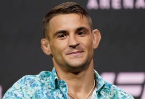 UFC Fighter Dustin Poirier: 25 Things You Don’t Know About Me (I Was Most Star Struck Meeting Mike Tyson!) blue aqua shirt