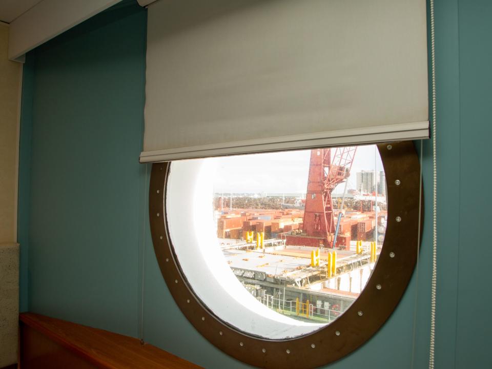 A window looking out over a shipping area.