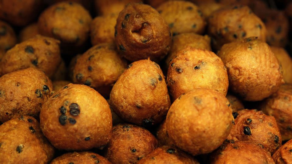 An oliebol is a doughnut-like product, traditionally made and consumed in the Netherlands during the New Year's celebrations. - BAS CZERWINSKI/AFP/Getty Images