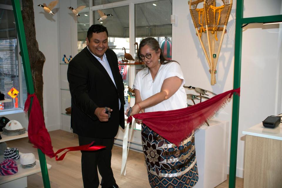 Left, Dale Cooper, right, Grand Chief Mandy Gull-Masty cut ribbon at soft launch opening at Wachiya store. 