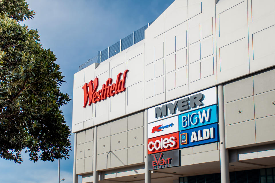 Westfield shopping centre exterior view with logo sign at carpark entrance
