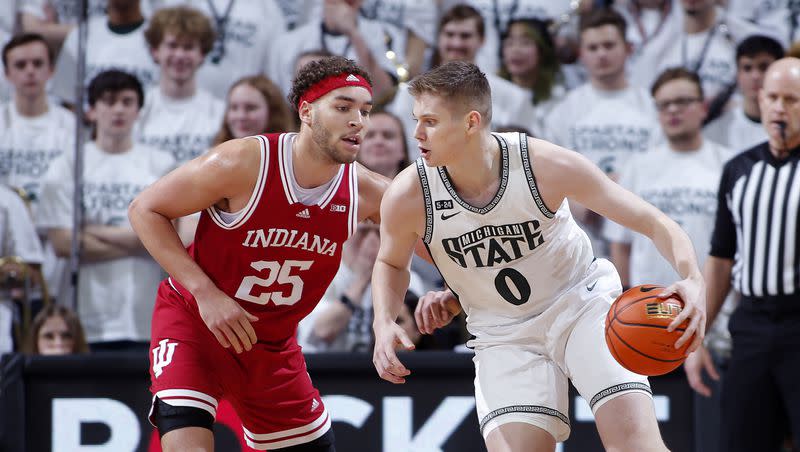 Michigan State’s Jaxon Kohler, right, drives against Indiana’s Race Thompson during an NCAA college basketball game, Tuesday, Feb. 21, 2023, in East Lansing, Mich.