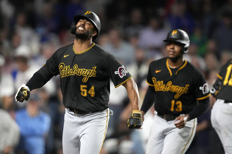 Pittsburgh Pirates' Joshua Palacios celebrates his pinch-hit, three-run home run off Chicago Cubs relief pitcher Julian Merryweather during the ninth inning of a baseball game Thursday, Sept. 21, 2023, in Chicago. (AP Photo/Charles Rex Arbogast)