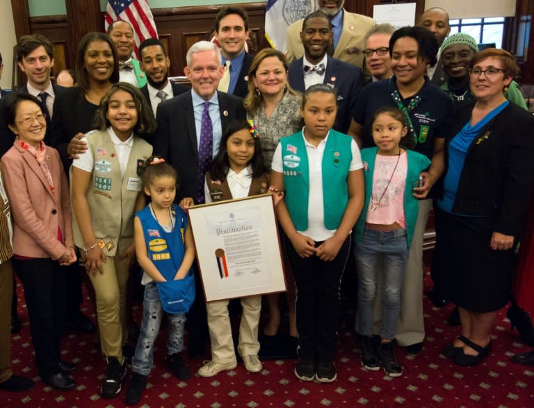 Members of Girl Scout Troop 6000, are honored and recognized for the troop's unique status, as the first troop exclusively for homeless girls