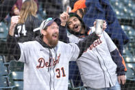 Detroit Tigers fans celebrate the team's 1-0 shutout of the Chicago White Sox after the White Sox's home opener baseball game Thursday, March 28, 2024, in Chicago. (AP Photo/Charles Rex Arbogast)