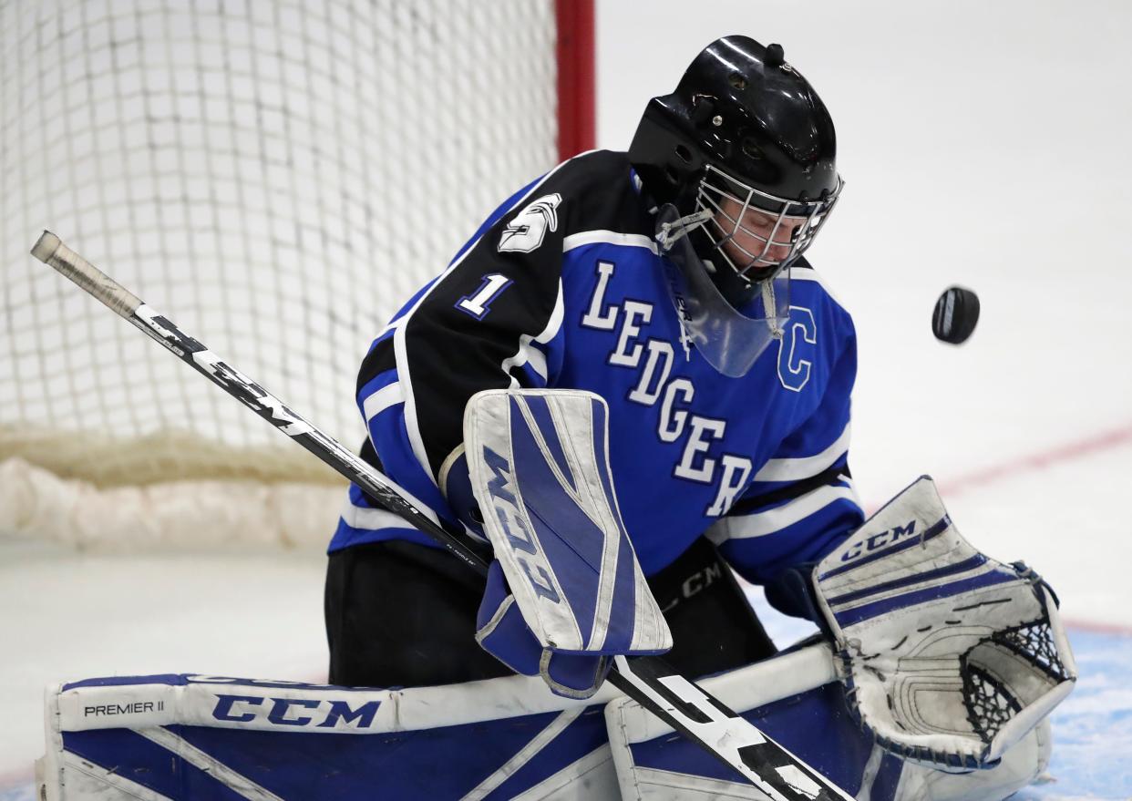 St. Mary's Springs Academy's Brendan Gaertig (1) stops a shot on goal by New Richmond High School during their WIAA Division 2 boys championship hockey game Saturday, March 2, 2024, at Bob Suter's Capitol Ice Arena in Middleton, Wisconsin.