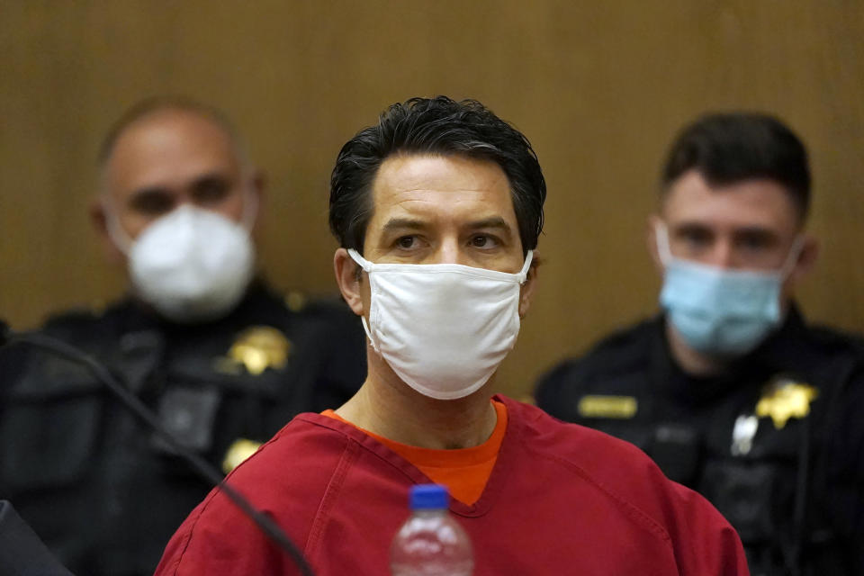 FILE - Scott Peterson listens during a a hearing to determine whether he gets a new trial for the 2002 murder of his pregnant wife, Laci Peterson, and unborn son because of juror misconduct at the San Mateo County Superior Court in Redwood City, Calif., on Feb. 25, 2022. A California judge on Tuesday, Dec. 20, rejected a new murder trial for Peterson, nearly 20 years after he was charged with dumping the bodies of his pregnant wife and the unborn child they planned to name Conner into the San Francisco Bay on Christmas Eve 2002. (AP Photo/Jeff Chiu, Pool, File)