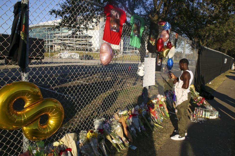 <div class="inline-image__caption"><p>People attend a makeshift memorial on November 7, 2021, at the NRG Park grounds where eight people died in a crowd surge at the Astroworld Festival in Houston, Texas. </p></div> <div class="inline-image__credit">Thomas Shea/AFP/Getty</div>