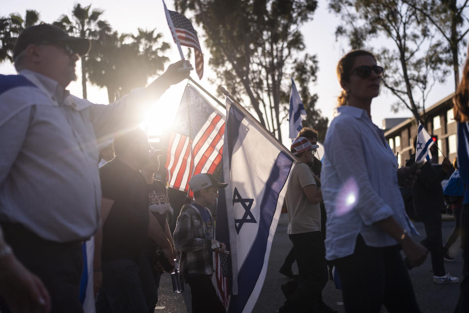 Pro-Israel supporters march outside the University of Southern California campus in Los Angeles, Wednesday, May 8, 2024. (AP Photo/Jae C. Hong)