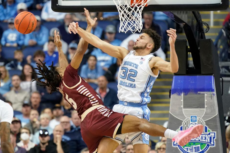 North Carolina forward Pete Nance blocks a shot by Boston College guard DeMarr Langford Jr. in the Atlantic Coast Conference Tournament in Greensboro, N.C., Wednesday, March 8, 2023.