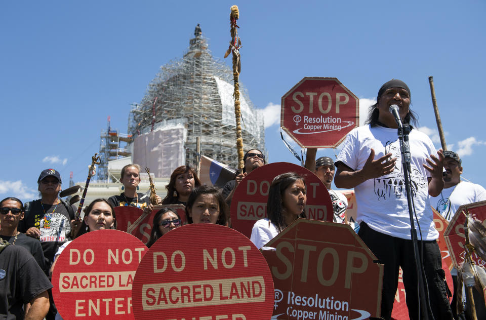 FILE - Tribal councilman Wendsler Nosie Sr. speaks with Apache activists during a rally to save Oak Flat, land near Superior, Ariz., sacred to Western Apache tribes, in front of the U.S. Capitol on July 22, 2015, in Washington. An Apache group battling a foreign mining firm that wants to build one of the largest copper mines in the United States on what tribal members say is sacred land gets a new chance to make its point Tuesday, March 21, 2023, when a full federal appeals court panel takes another look at the case. (AP Photo/Molly Riley, File)