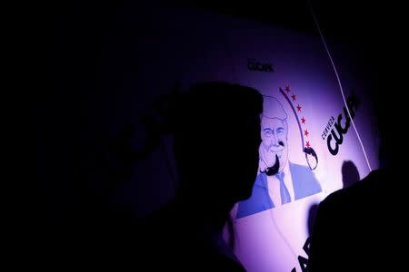 An image of Republican presidential nominee Donald Trump is seen during a Mexican brewery booze-up in Mexico City, Mexico October 20, 2016. REUTERS/Carlos Jasso