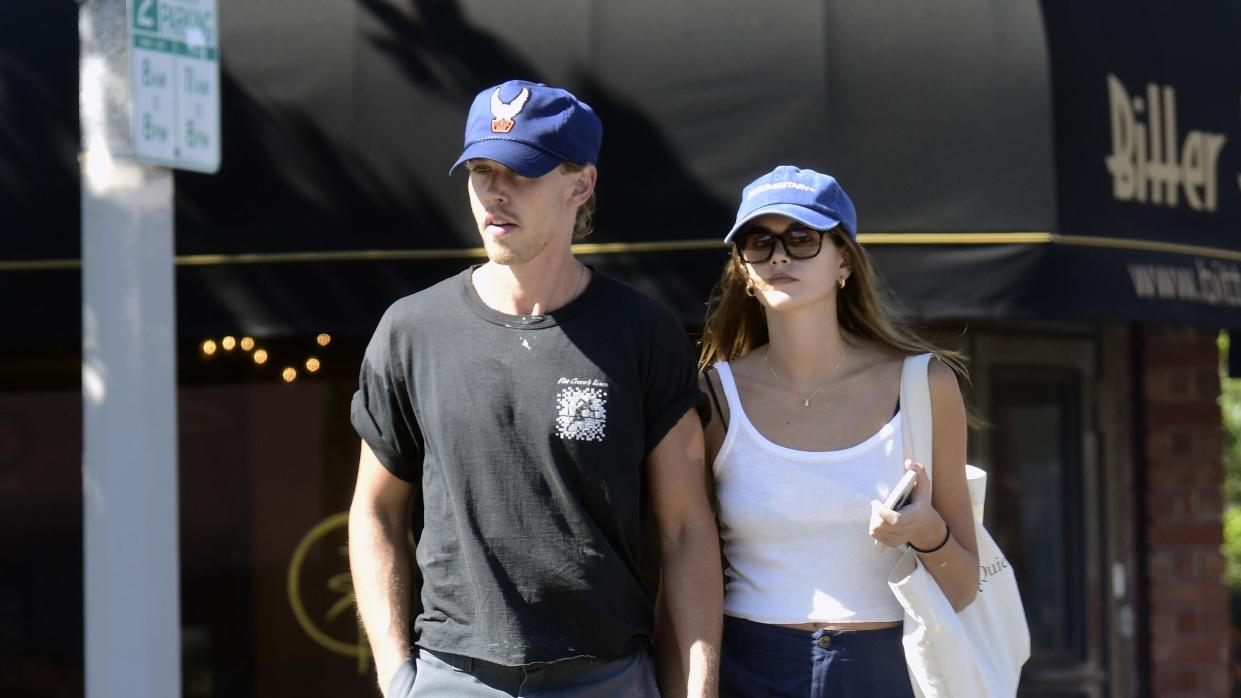 kaia gerber austin butler coordinating casual looks holding hands