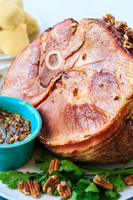 <p>Spicy Southern Kitchen</p><p>This easy-to-make praline glazed ham is sure to add lots of flavor to your holiday table.</p><p><strong>Get the recipe: <a href="https://spicysouthernkitchen.com/praline-glazed-ham/" rel="nofollow noopener" target="_blank" data-ylk="slk:Praline-Glazed Ham;elm:context_link;itc:0;sec:content-canvas" class="link ">Praline-Glazed Ham</a></strong></p>