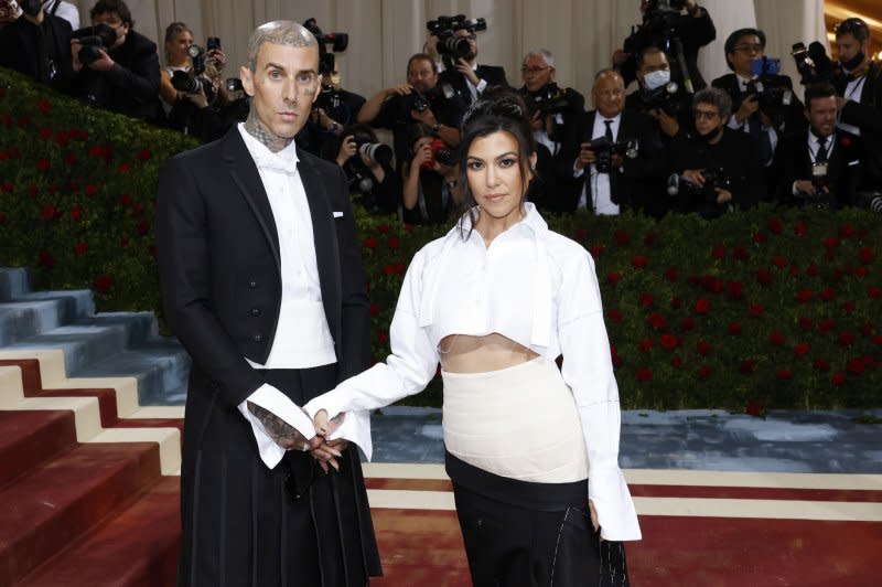 Travis Barker and Kourtney Kardashian have reportedly welcomed their first child together. File Photo by John Angelillo/UPI