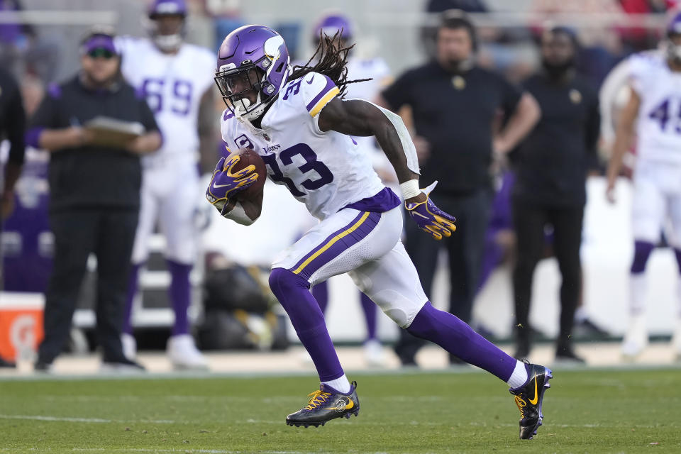 Minnesota Vikings running back Dalvin Cook (33) runs against the San Francisco 49ers during the second half of an NFL football game in Santa Clara, Calif., Sunday, Nov. 28, 2021. (AP Photo/Tony Avelar)