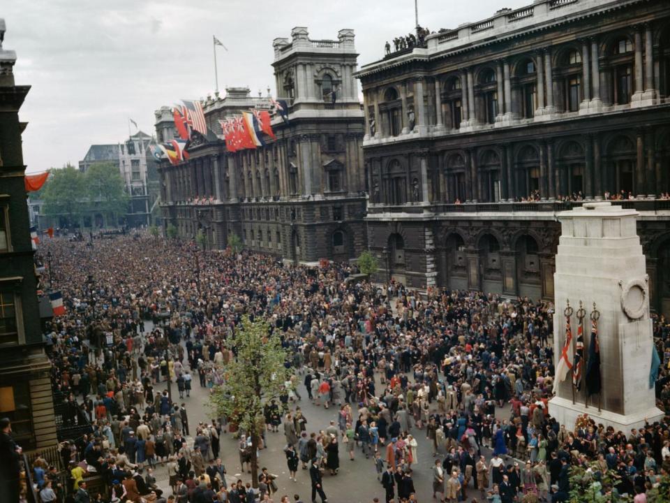 Crowds celebrating VE Day near the Cenotaph in Whitehall, 8 May 1945 (Imperial War Museum )
