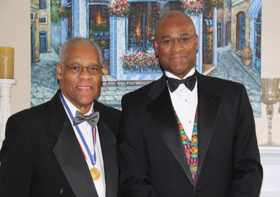 Delano Lewis (left), former U.S. Ambassador to the Republic of South Africa, pictured with his son, Geoffrey Lewis Sr.