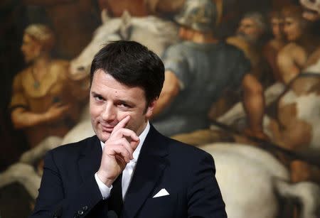 Italian Prime Minister Matteo Renzi gestures during a news conference with his Greek counterpart Alexis Tsipras at Chigi palace in Rome February 3, 2015. REUTERS/Remo Casilli