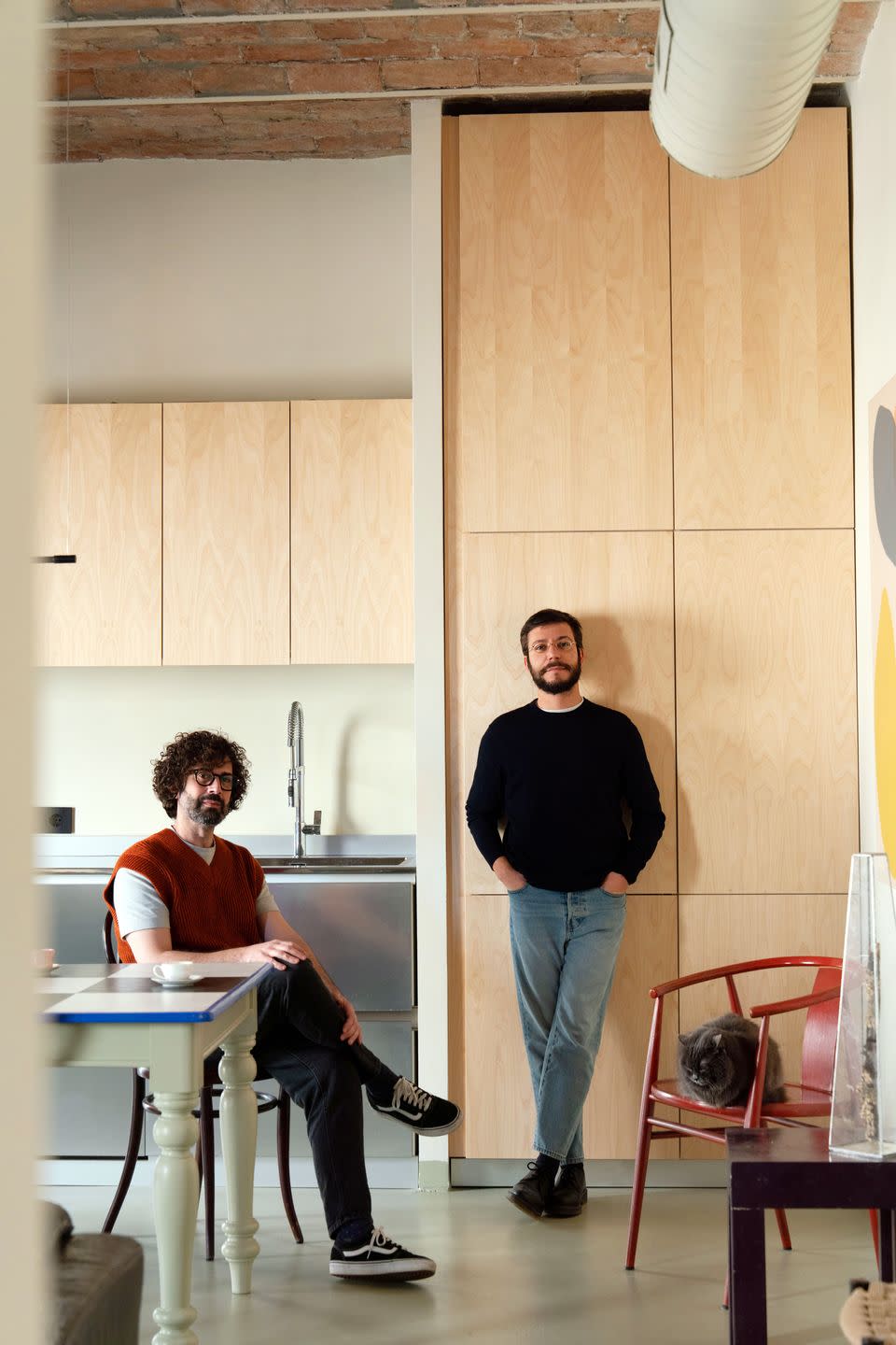 matteo soddu and sergio marras in their rome apartment