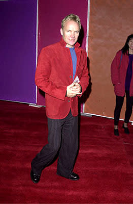 Sting is caught red-jacketed at the Hollywood premiere of Walt Disney's The Emperor's New Groove