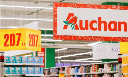 The logo of French retailer Auchan is pictured at company's hypermarket in Moscow, Russia, May 19, 2017. REUTERS/Maxim Shemetov