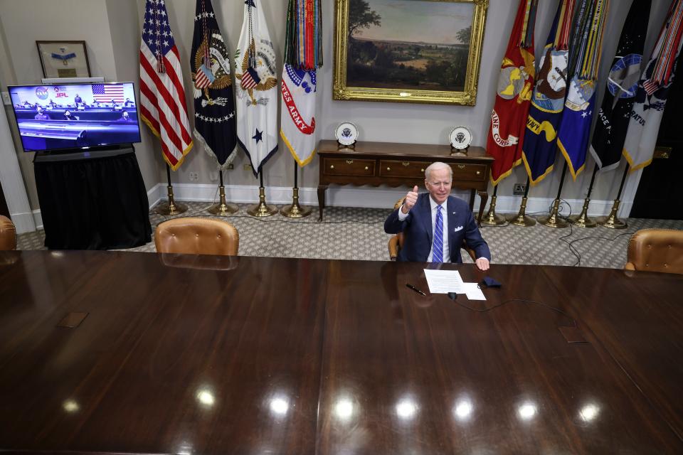 <p>Joe Biden gives a thumbs up as he speaks during a virtual call to congratulate Nasa on the successful Mars landing</p> (EPA)