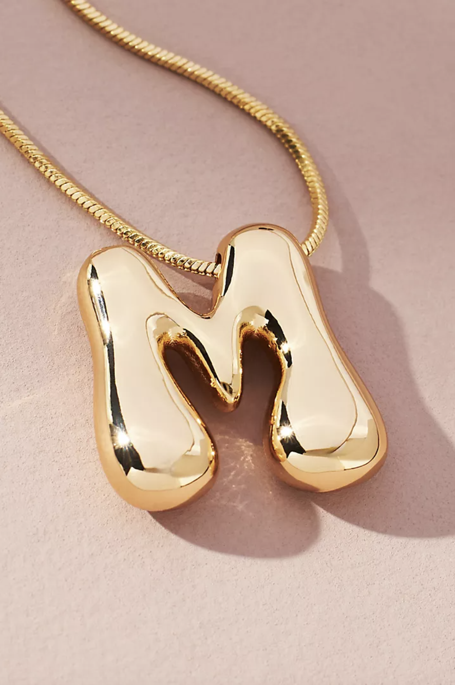 <p><a href="https://go.redirectingat.com?id=74968X1596630&url=https%3A%2F%2Fwww.anthropologie.com%2Fshop%2Fhybrid%2Fbubble-letter-monogram-necklace%3Fcolor%3D902%26type%3DSTANDARD%26size%3DOne%2BSize%26quantity%3D1&sref=https%3A%2F%2Fwww.elle.com%2Fculture%2Fcelebrities%2Fa60636748%2Fmillie-bobby-brown-lavender-bikini-photos%2F" rel="nofollow noopener" target="_blank" data-ylk="slk:Shop Now;elm:context_link;itc:0;sec:content-canvas" class="link rapid-noclick-resp">Shop Now</a></p><p>Bubble Letter Monogram Necklace</p><p>www.athroplogy.com</p><p>$48.00</p>