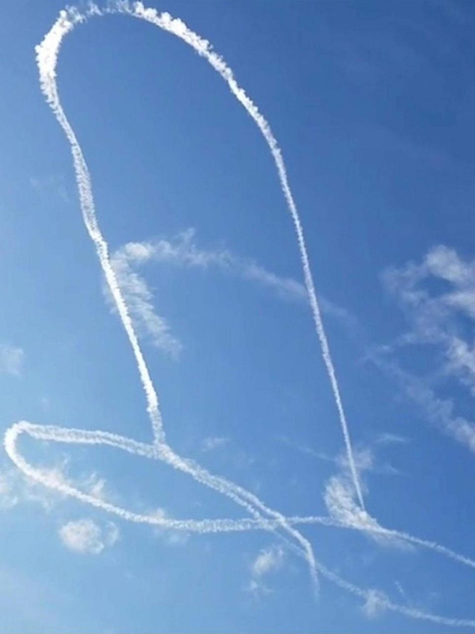 The penis drawn by a US Navy air crew with the exhaust of an advanced fighter jet is seen in the skies over Okanogan County in Washington state (INSTAGRAM @RREED.69/via REUTERS)