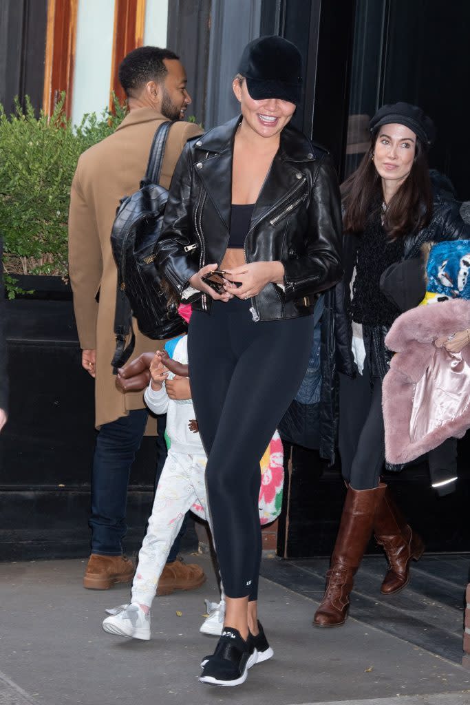 Chrissy Teigen is heading to New York Airport.  - Credit: RCF / MEGA