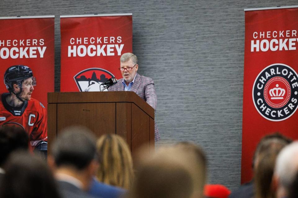 Michael Khan, now the largest minority partner of the Charlotte Checkers, speaks during Monday’s announcement.