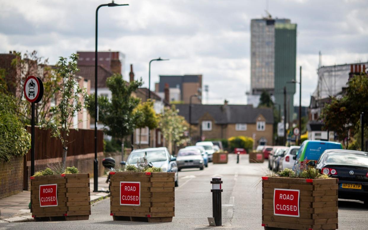 The roll-out of low traffic neighbourhoods has become increasingly divisive as both side have taken waged online campaigns fighting the Government's £250 million scheme  - Heathcliff O'Malley 