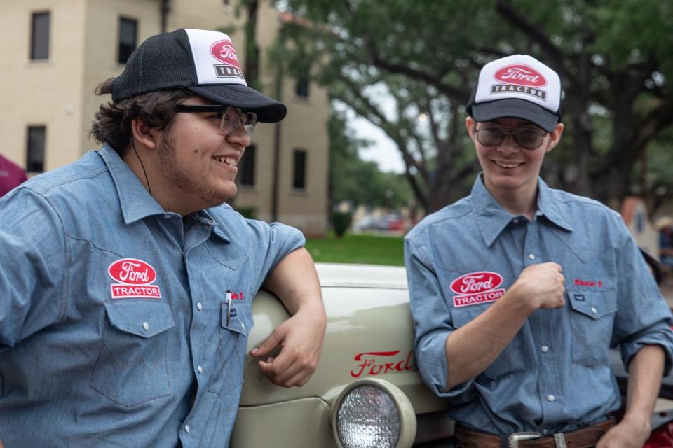 Banquete seniors Zeke Espinoza, left, and Hunter Fox, explain their restored of a 1954 Ford NAA tractor during an agricultural mechanics project show at Texas A&M-Kingsville on Tuesday, April 23, 2024, in Kingsville, Texas.