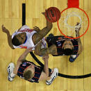 OMAHA, NE - MARCH 16: Bradley Beal #23 of the Florida Gators lays up a shot against Paul Jeperson #2 and Mike Scott #23 of the Virginia Cavaliers in the second round of the NCAA Men's Basketball Tournament at CenturyLink Center on March 16, 2012 in Omaha, Nebraska. Florida defeated Virginia 71-45. (Photo by Doug Pensinger/Getty Images)