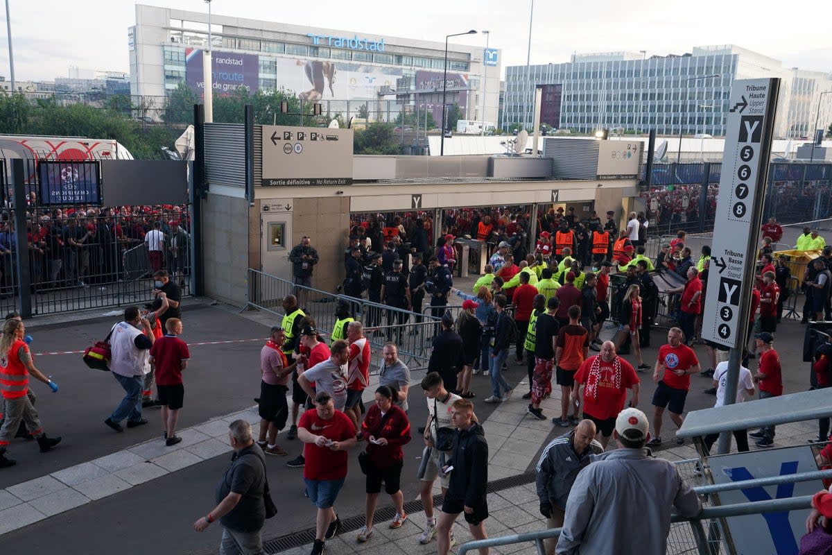 Fans waiting outside the Stade de France gates ahead of the Champions League final (Nick Potts/PA) (PA Archive)