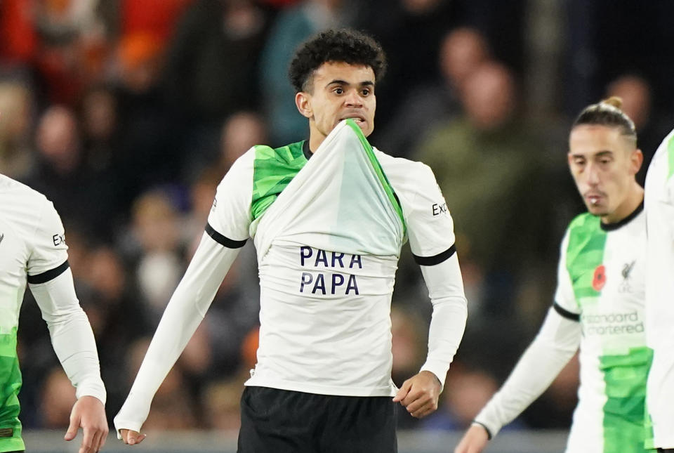 Luis Díaz asks for his father to be set free after scoring a goal during Sunday's game against Luton Town. (Photo by Zac Goodwin/PA Images via Getty Images)