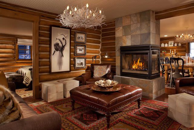 <p>Courtesy of Brush Creek Luxury Ranch Collection</p> A cabin at Brush Creek Ranch.