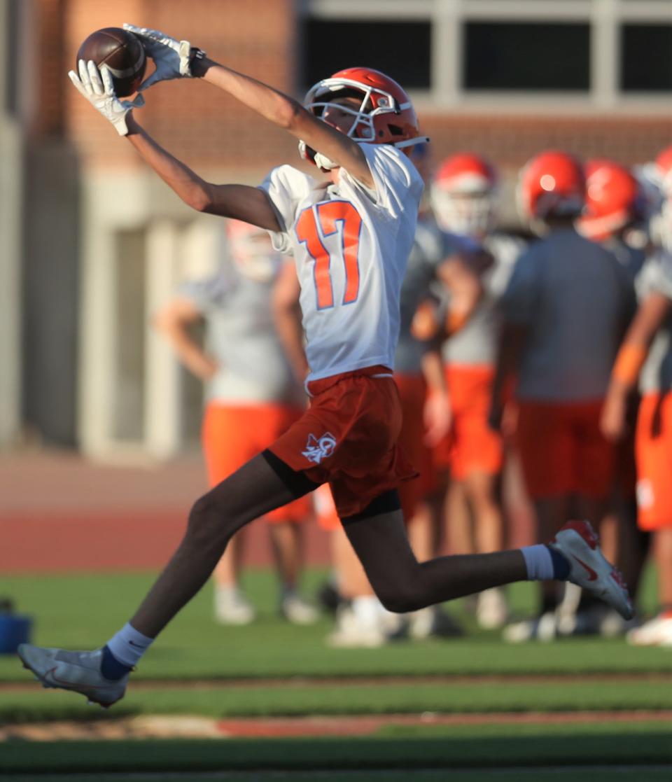 A San Angelo Central High School receiver snags a reception during the first preseason practice at San Angelo Stadium on Monday, Aug. 8, 2022.