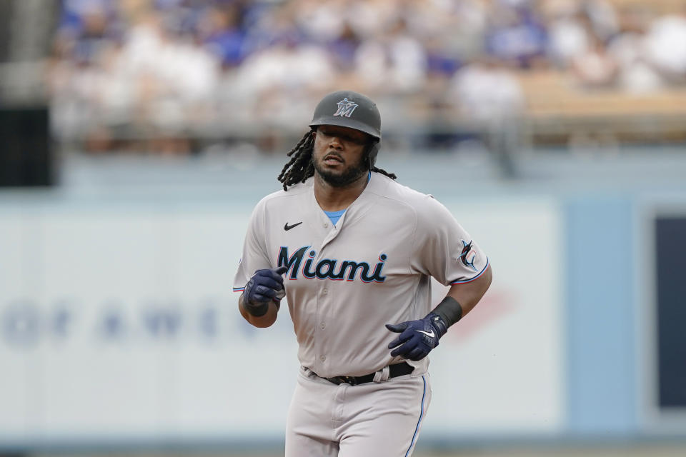 Miami Marlins designated hitter Josh Bell runs the bases after hitting a home run against the Los Angeles Dodgers during the first inning of the second baseball game of a doubleheader Saturday, Aug. 19, 2023, in Los Angeles. (AP Photo/Ryan Sun)